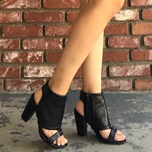Black faux leather heels
